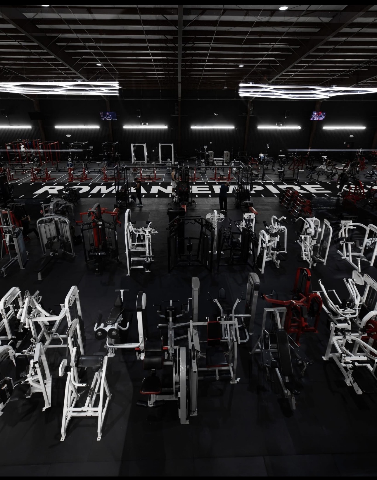 Training floor inside Roman Empire Gym in League City, TX where iAMLIFT clients train